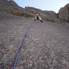 Approaching the crux on pitch 2.