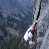 unknown climber on the 5.10 "direct" first pitch of Outer Space.