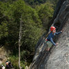 Another shot of the crux slab on Haunted by Waters at San Ysidro.  Here, Sheila climbs as her team watches from the stream bed.