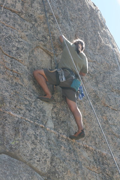 Albert on Extinction 5.11b.