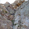 The third pitch of eleventh hour.  Just about to reach the crux slab section up and left of the roof,