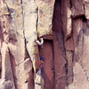 Steve Grossman (during his Royal Robbins phase) turns the Tralfamadore Roof on the second ascent in 1976. Paul Davidson belays. Volunteer Canyon, AZ