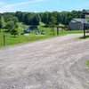 Rigaud .... Climbers park left side inside inline with the chairlift area, note big front gate that gets locked if you stay too long. Trail up to cliff is small trail inside far left ski hill.