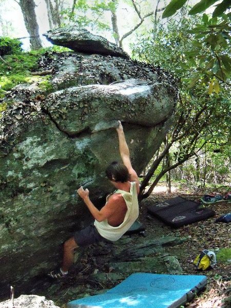 Steve on "Biggie Good" (V0+) On the Earth Boulder.