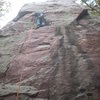 At the ledge before the crux, HEFTY run out. Actual climbing is in the watermarks on the right.