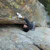 An unknown climber finishing up the first pitch.