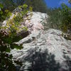 This is a shot of "Buddha" 5.8. Climb to the middle ledge then up the middle of the bulge.