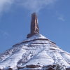 some tower with snow on it.