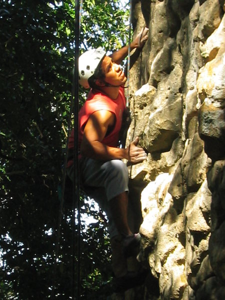 C. Tapia climbing a route on La Piedrita.