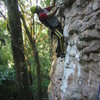 A. Aldama climbing a small overhang on La Piedrita.