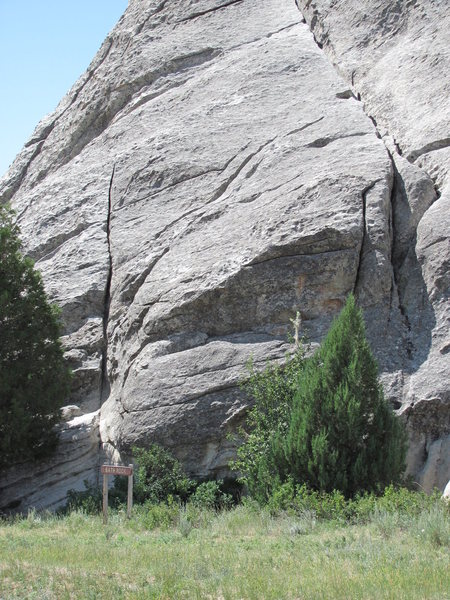 Start of route behind prominent juniper, near sign: Bath Rock.