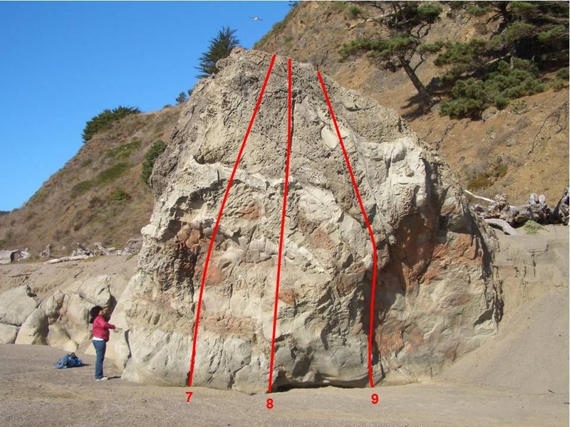 Climbs on the south face of Navarro Beach Boulder: (7) Señor V0 or 5.10c; (8) Señora V0 or 5.10c; (9) Señorita V0- or 5.10a. Note the steep sand bank behind the rock, which may cover the rock during part of the year.