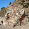 Climbs on the south face of Navarro Beach Boulder: (7) Señor V0 or 5.10c; (8) Señora V0 or 5.10c; (9) Señorita V0- or 5.10a. Note the steep sand bank behind the rock, which may cover the rock during part of the year.