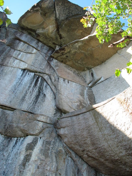 Looking up at Dave Quinn's  "Wise Owl" 12b. It follows the corners and flakes up and to the left side of the roof.