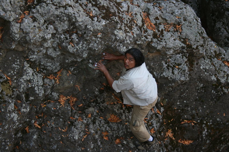 Albert retrieving the water bottle he dropped going back over the dam.