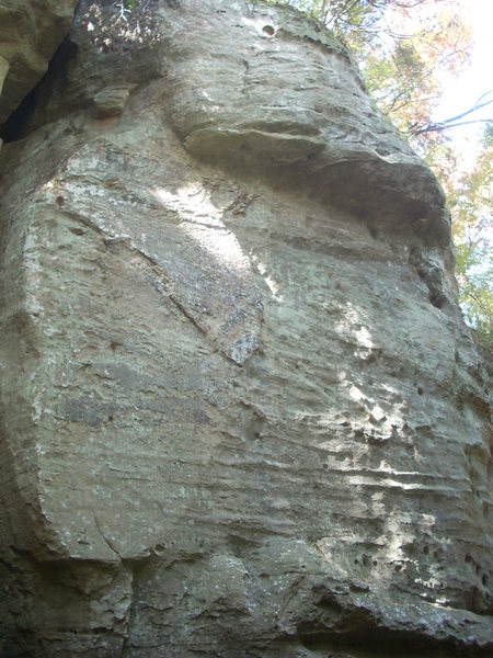 Up the face to the overhang.