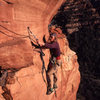 Larry Coats leading the short but very exposed last pitch of the Southwest Face (see if you can guess the era from the outfit!).