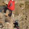 Walt belaying as Tom tops out on <em>Shadow and Flame</em>.