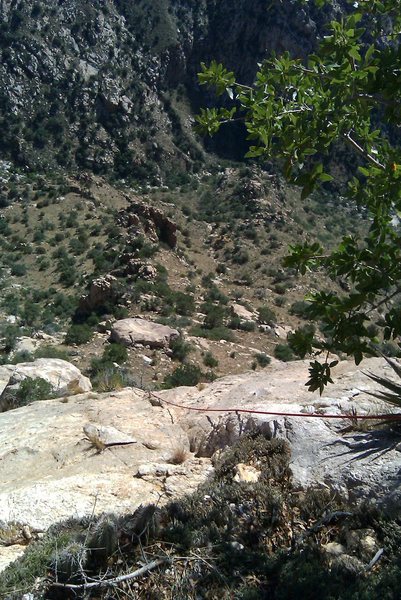 Looking down pitch 3.  The detatched looking block was successfully trundled as were other loose rocks.