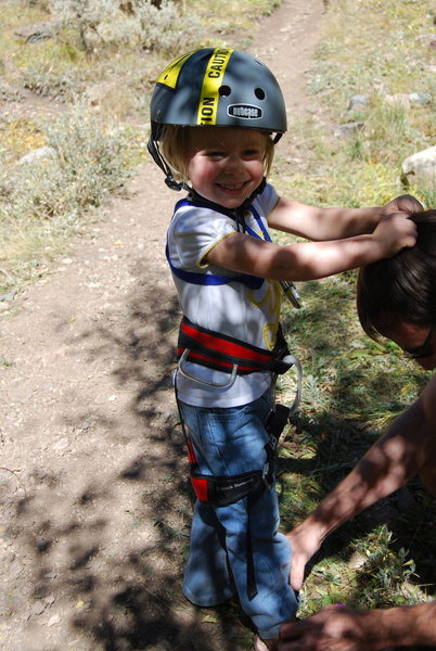 Papa's hair works great for balance while putting on gear.