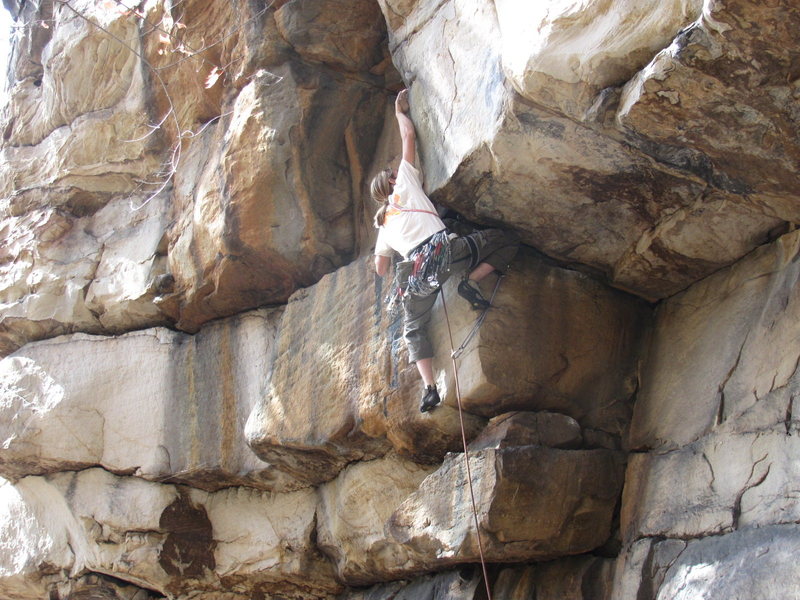 Bryan pulling the crux on Dreamtime at the Junkyard Wall