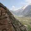 First ascent of Black Widow.  First pitch not visible, climber at the crux.