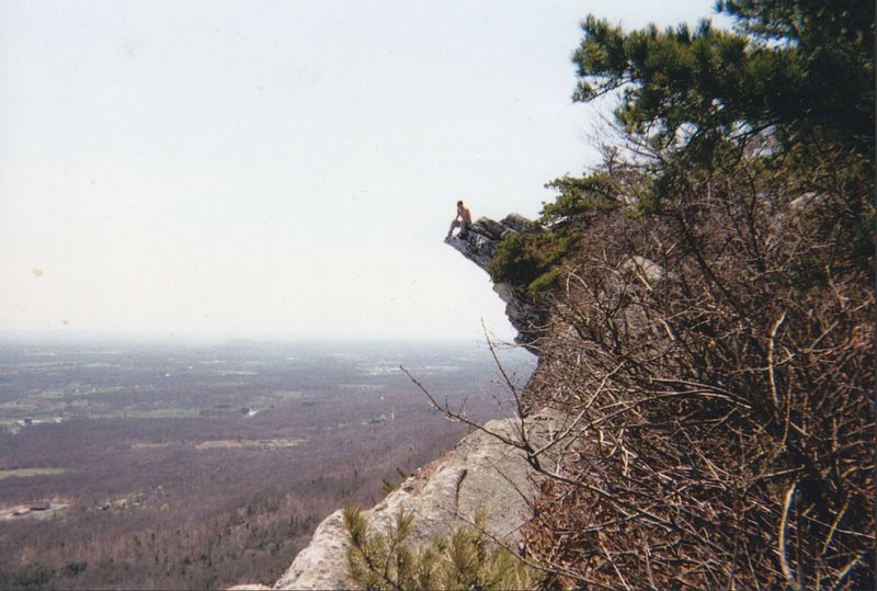 Dan T. enjoying the view (and making my palms sweat watching him) on top of Milbrook, Shawangunks