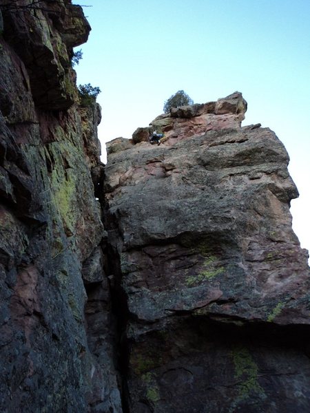 Climbing to the top.... Lot of dried lichen on the rock made the footing precarious enough to get someone climbing this route the first time excited.