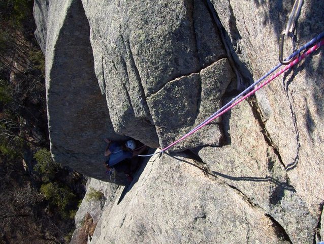 looking down from the top of pitch 3 onto the second roof.