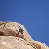 Mary working through the crux bulge.