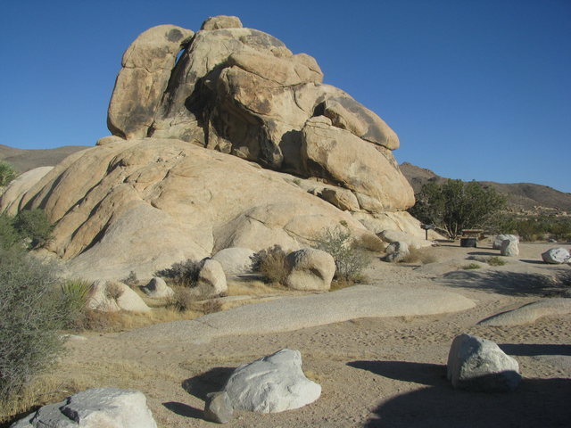 West Face of McClure's Clump. Coyote Bait climbs the right side of the roof on featured black rock.