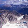 The consolation peaks<br>
Photo by MP contributor Kurt Johnson<br>
<br>
Blue - Northeast Ridge, Eastpost Spire<br>
Yellow - North Ridge of North Crescent Tower<br>
Red - McTech Arete, Crescent Spire<br>
Green- Energy Crisis<br>
<br>
Red Circle - Applebee Meadows