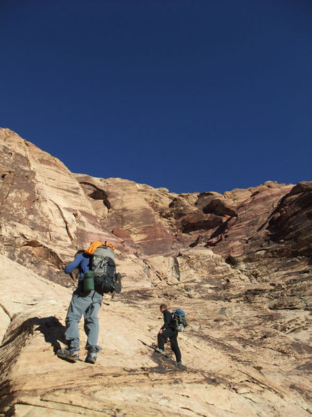 Climbers from Golden CO on the approach to Eagle Wall. They were headed for Levitation 29.