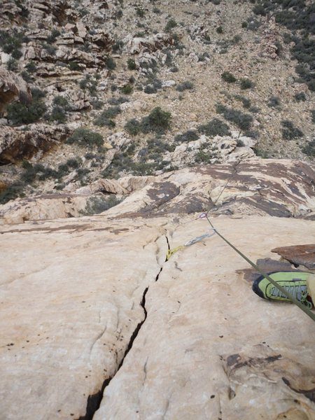 Looking down the crack in the slab of pitch 3.