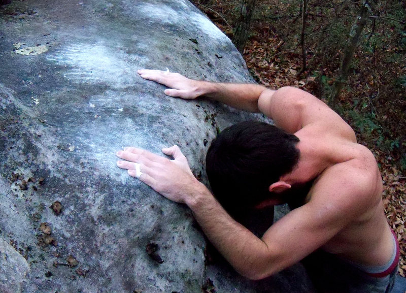 Steve on the fun sloper top-outs on the Acorn Boulder