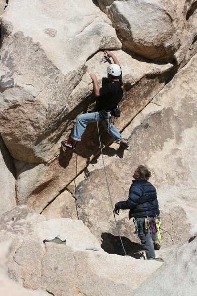 Nathan Fitzhugh making a crucial and tough placement to protect getting to the first bolt.