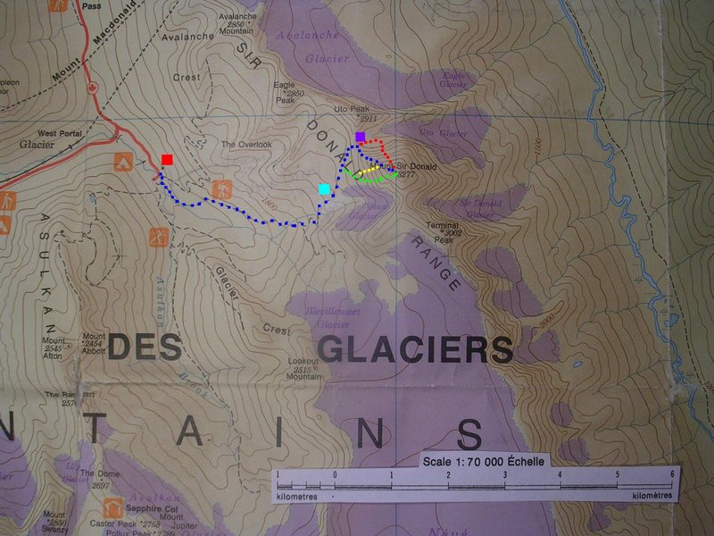 Mount Sir Donald Map<br>
contour interval:100 meters<br>
<br>
Blue squares - Northwest Arete<br>
Yellow - fixed rappel descent<br>
Red - Beckey-Chouinard N Face<br>
Violet - West Face<br>
<br>
Big red sq - Wheeler Hut<br>
Light Blue sq - Vaux Bivouac<br>
Violet Square - Uto Col <br>
<br>
At right, Beaver-Duncan Trench, Selkirks west, Purcells east.
