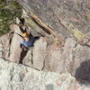 Just below the crux on the second pitch.  The gear with the purple sling, 00 C3, is at the crux move.