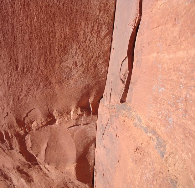 Looking at the scary traverse from the bolt anchors. Commit to it is easier than what it looks