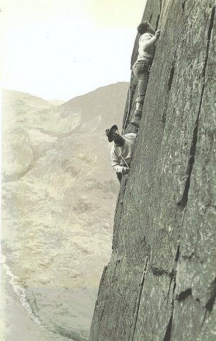 Historic Photo. 1954.  The late George Fisher (of Keswick climbing shop fame) belaying Paul Ross on Kern Knotts Crack