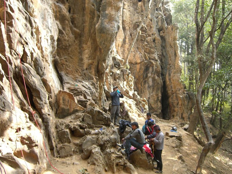 Looking toward the right hand side of the cliff.  The locals are resting between climbs.