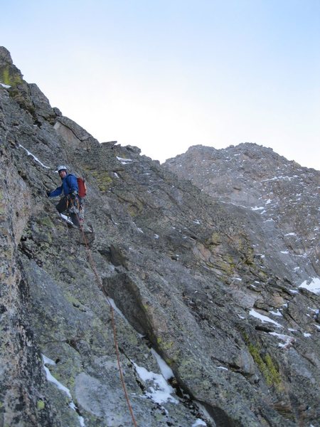 Climbing the last pitch to the summit of The Saber during an ascent of Prise de Fer on 1/29/11.  Photo by Andy Grauch.