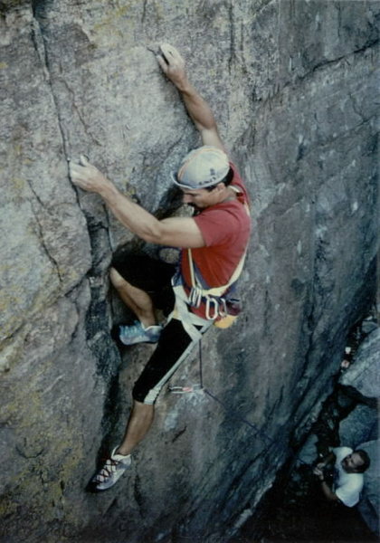 1989...JB on Three Piece Route (5.12-) at Windy Point overlook. Photo: Brian Kristofitz, Attentive belayer: Pete Lofquist.  (FA by EFR)