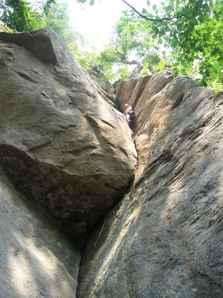 Taking a rest after pulling the roof on Arachnid 5.8 Red River Gorge.