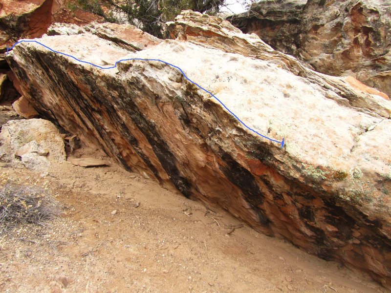 Start on far right side. Heel hook and toe on across the 30 feet using crimps and mild slopers.