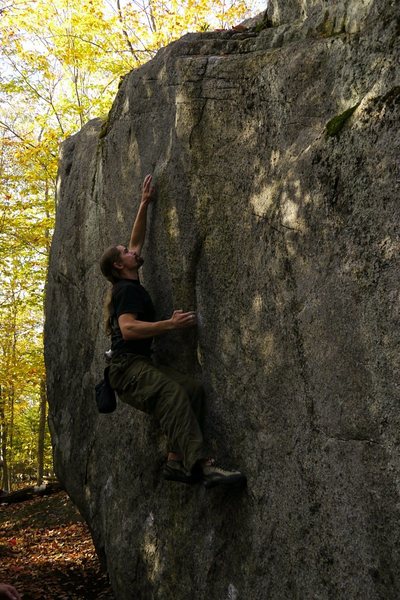 Thrust Fault, although only V3 this is a must do problem. I got it on my second attempt and would have flashed it if I had not mucked up my feet on the first go. The top out is not gimme so stay focused after hitting the lip jug.<br>
<br>
Photo: Andrew Pallek <br>
http://www.flickr.com/photos/40445678@N00/<br>
<br>
