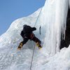 Mustafa follows the steep part of the first pitch on Dexter Creek Slabs.