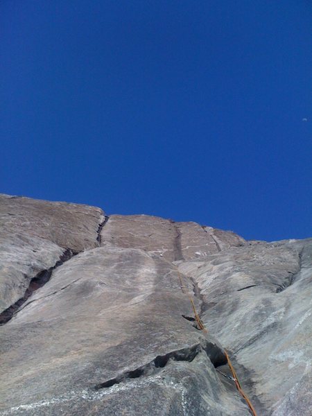 Photo showing pitch 5 (shared with groover) and pitch 6 (the steep black streak directly above the ropes)