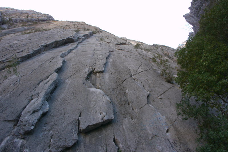 Mugre Mugre starts on a big flake two lines to the right of Don Quixote, the prominent corner.