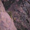 looking back at the belay atop pitch 3, after the "traverse way left" to start pitch 4